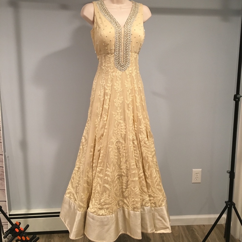 Indian traditional beaded beige dress.